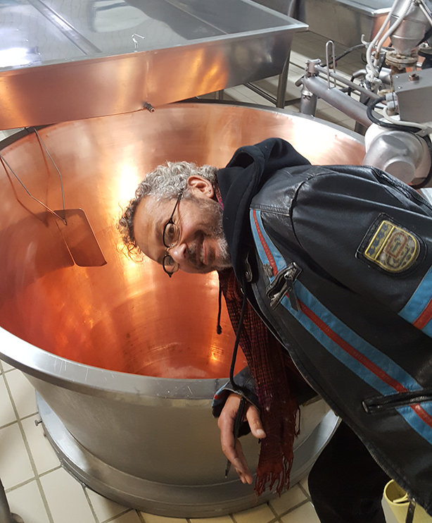 Ari checking out the vats that parmesan is made in 