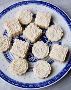 moon cakes on a blue plate