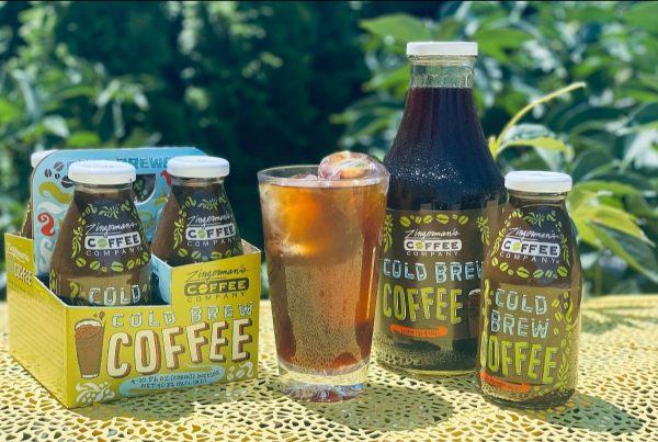 coffee company cold brew in various containers on a yellow table