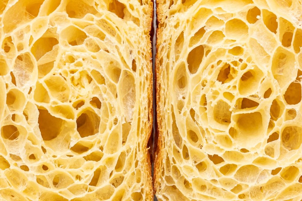 close up view of the inside of the inside of a croissant