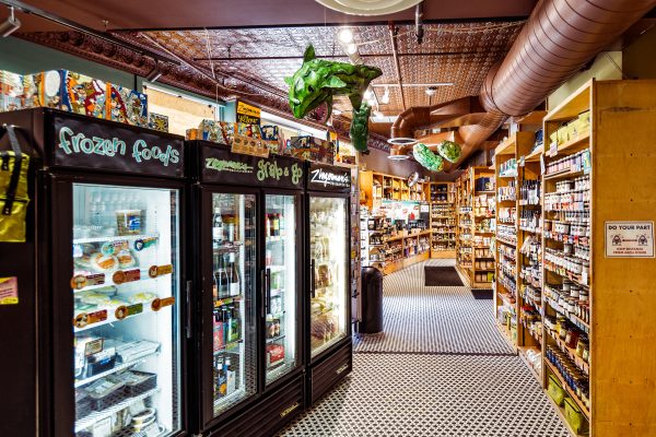 Interior of Zingerman's Deli with stocked shelves and fridges